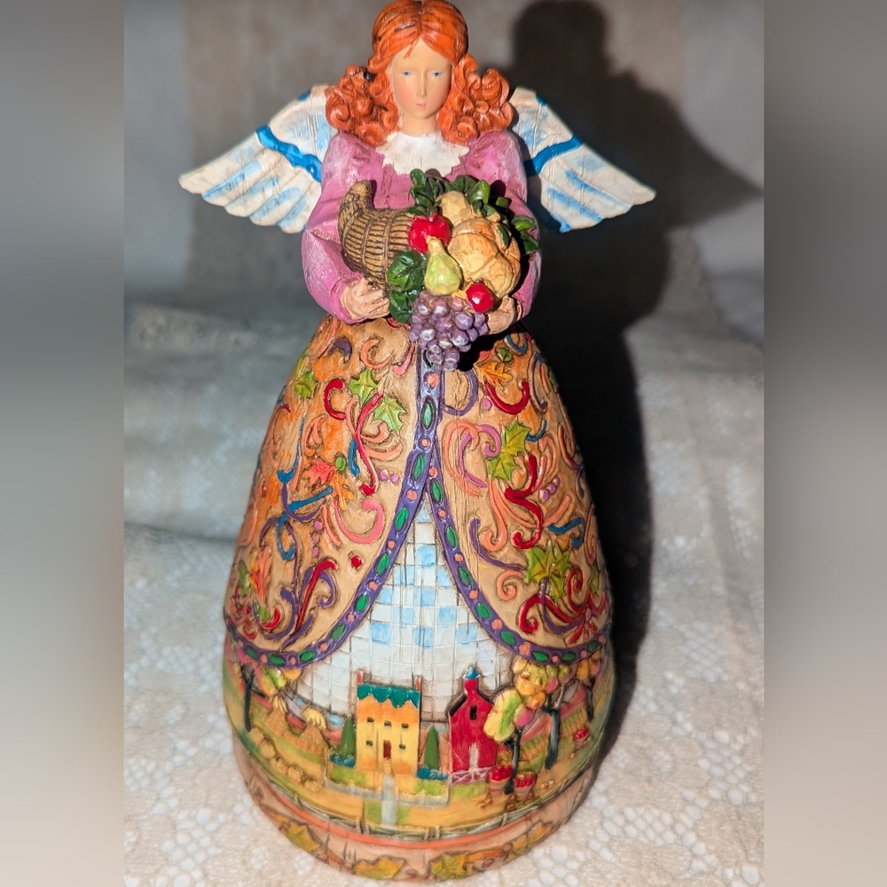 Jim Shore Enesco Bountiful Angel Figurine with Basket and Vibrant Fall Colors.